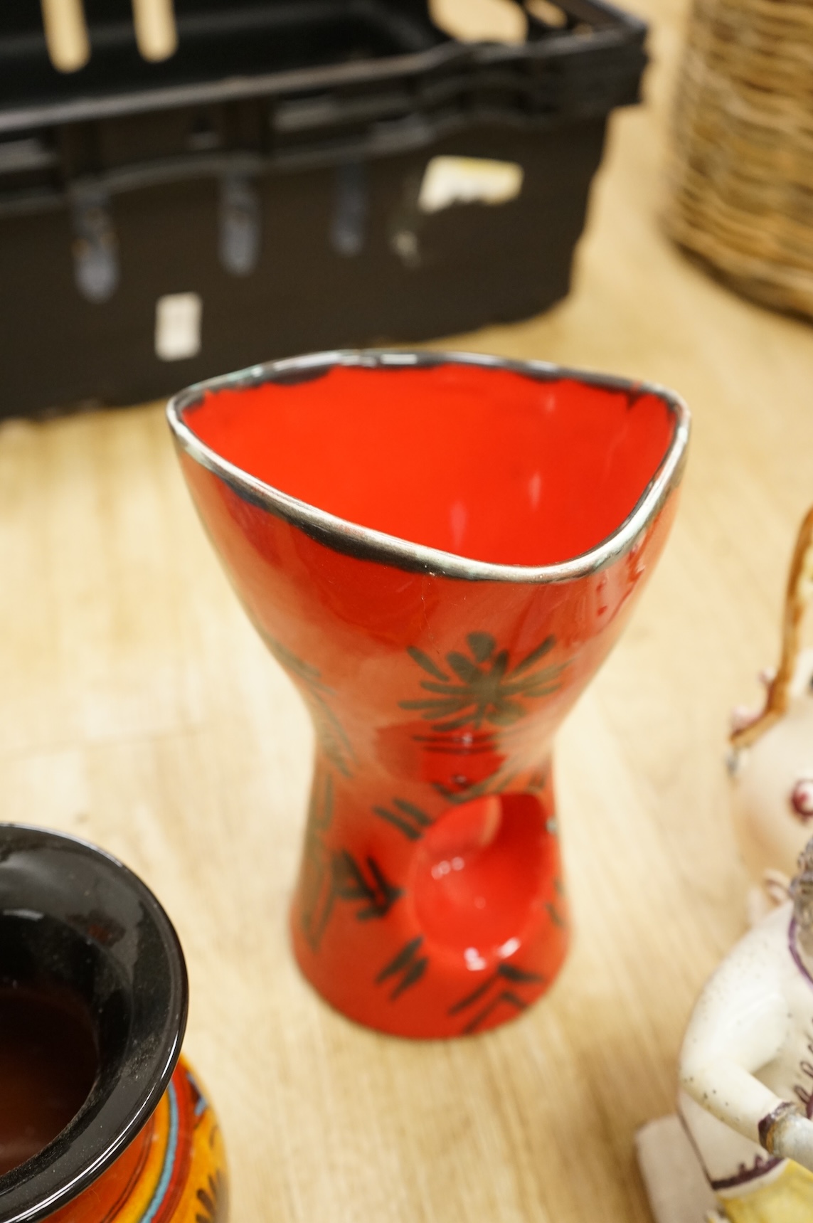 A collection of studio ceramics and pottery to include a Zsolnay vase and a Lyn Alves hexagonal dish
